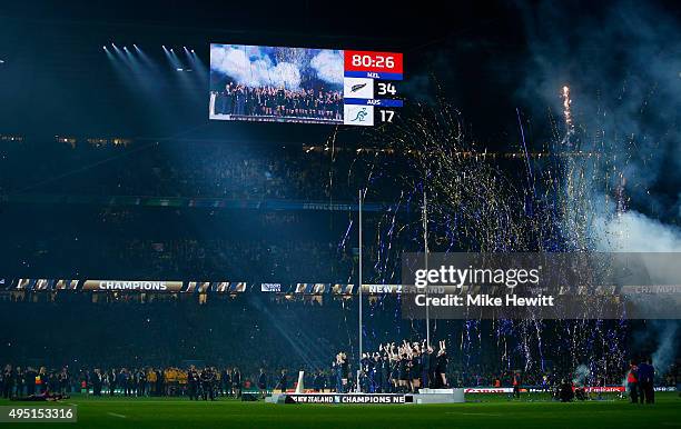 The New Zealand team celebrate as they lift the Webb Ellis Cup during the 2015 Rugby World Cup Final match between New Zealand and Australia at...