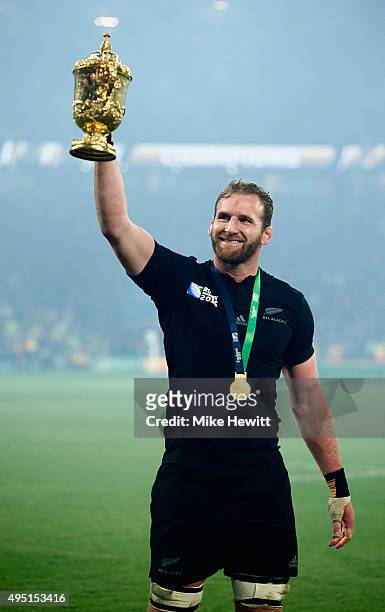 Kieran Read of New Zealand holds the Webb Ellis Cup aloft as he celebrates victory in the 2015 Rugby World Cup Final match between New Zealand and...