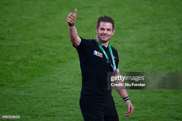 Richie McCaw of New Zealand gives the 'thumbs up' to fans after victory in the 2015 Rugby World Cup Final match between New Zealand and Australia at...
