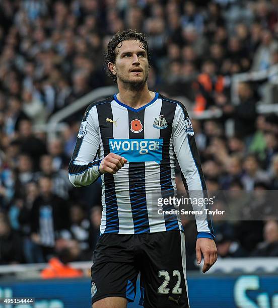 Daryl Janmaat of Newcastle makes a gesture with his fist during the Barclays Premier League match between Newcastle United and Stoke City at...