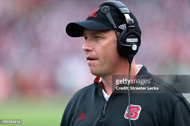 Head coach Dave Doeren of the North Carolina State Wolfpack watches on against the Clemson Tigers during their game at Carter-Finley Stadium on...