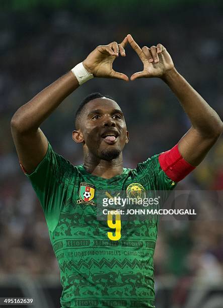 Cameroon's forward Samuel Eto'o celebrates after scoring during the friendly football match Germany vs Cameroon in preparation for the FIFA World Cup...