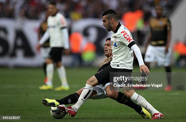 Bruno Henrique of Corinthians fights for the ball with Edilson of Botafogo during the match between Corinthians and Botafogo for the Brazilian Series...