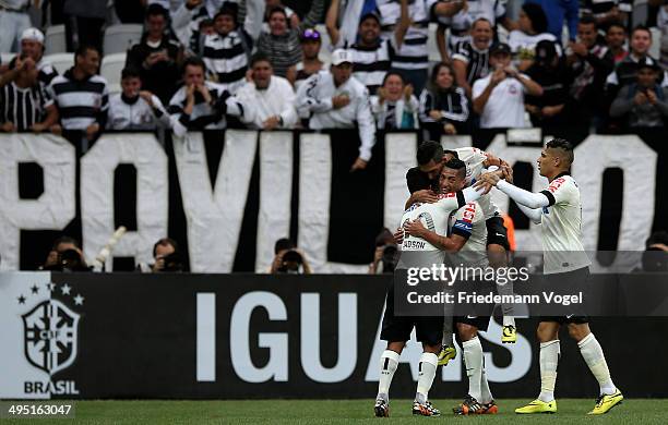 Jadson of Corinthians celebrates scoring the first goal with his team during the match between Corinthians and Botafogo for the Brazilian Series A...