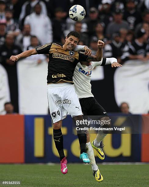 Guerrero of Corinthians fights for the ball with Bolivar of Botafogo during the match between Corinthians and Botafogo for the Brazilian Series A...