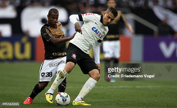 Guerrero of Corinthians fights for the ball with Airton of Botafogo during the match between Corinthians and Botafogo for the Brazilian Series A 2014...