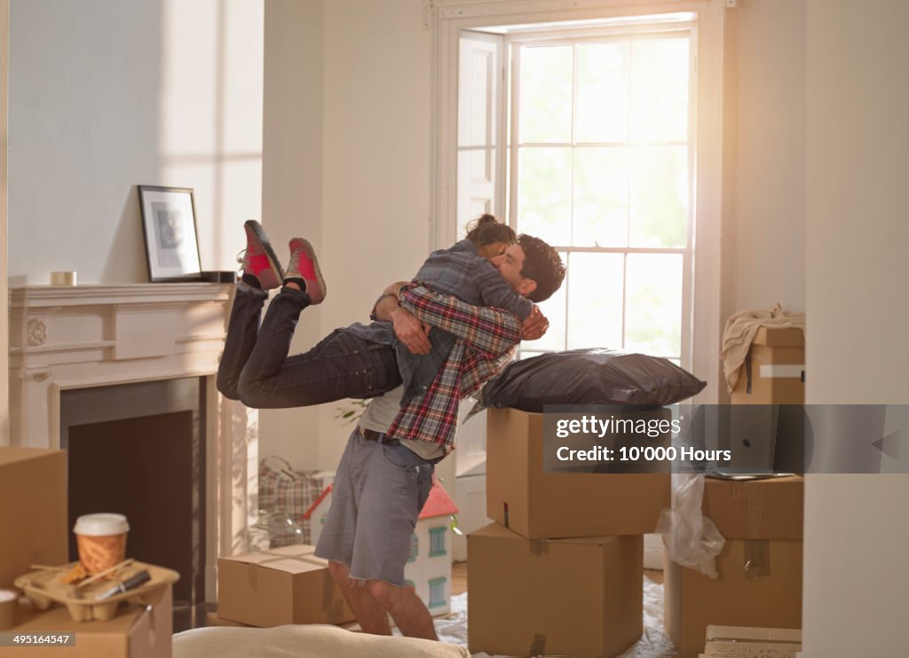 A couple celebrating moving in to a new home