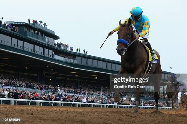 Jockey Victor Espinoza celebrates after riding American Pharoah to victory in the Breeders' Cup Classic at Keeneland Racecourse on October 31, 2015...