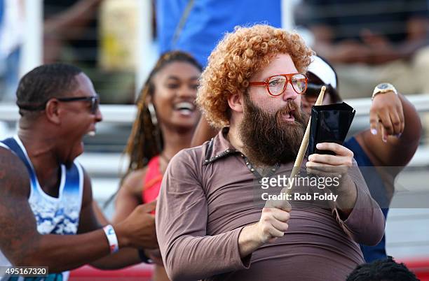 Fan plays a cowbell in the stands during the second half of the game between the Florida Atlantic Owls and the FIU Golden Panthers at FAU Stadium on...