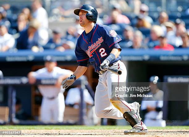 Brian Dozier of the Minnesota Twins follows through on a ninth inning two run double against the New York Yankees at Yankee Stadium on June 1, 2014...