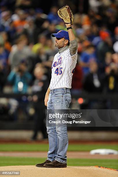 Singer Tim McGraw throws out the first pitch prior to Game Four of the 2015 World Series between the New York Mets and the Kansas City Royals at Citi...