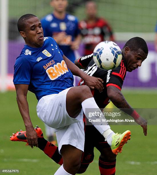 Borges of Cruzeiro struggles for the ball with Amaral of Flamengo during a match between Cruzeiro and Flamengo as part of Brasileirao Series A 2014...