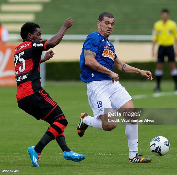Nilton of Cruzeiro struggles for the ball with Luiz Antonio of Flamengo during a match between Cruzeiro and Flamengo as part of Brasileirao Series A...