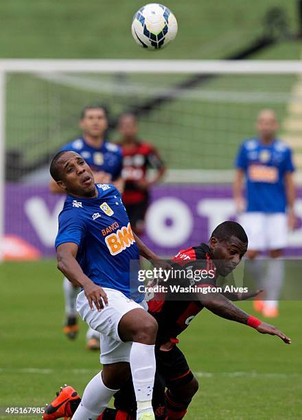 Borges of Cruzeiro struggles for the ball with Amaral of Flamengo during a match between Cruzeiro and Flamengo as part of Brasileirao Series A 2014...