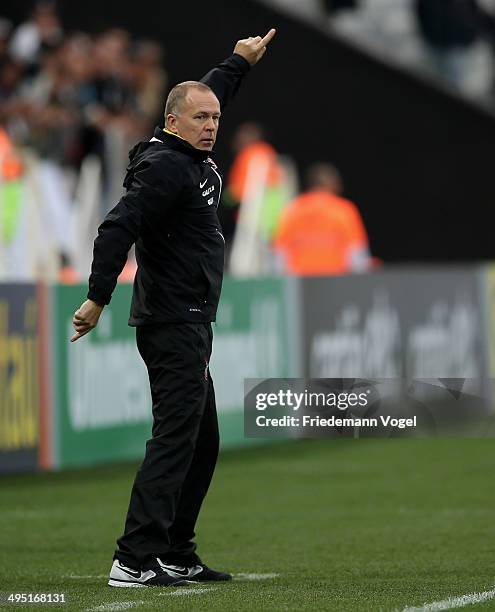 Head coach Luiz Antonio Venker Menezes of Corinthians gives advise during the match between Corinthians and Botafogo for the Brazilian Series A 2014...