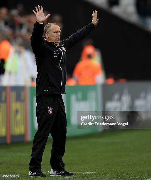 Head coach Luiz Antonio Venker Menezes of Corinthians gives advise during the match between Corinthians and Botafogo for the Brazilian Series A 2014...