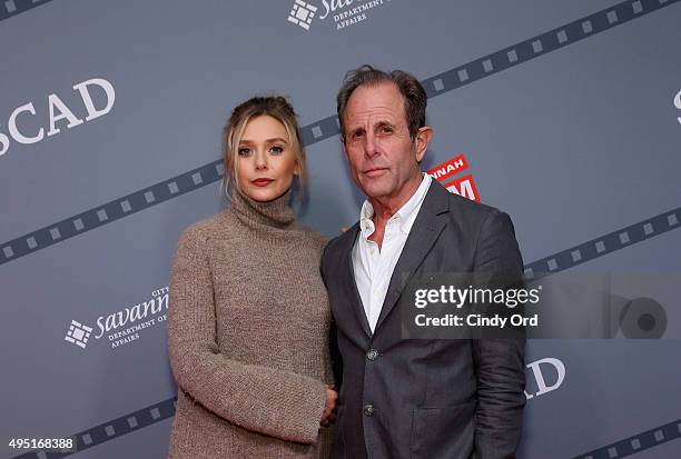 Actress Elizabeth Olsen and Director Marc Abraham of "I Saw the Light" poses for a photo during the Closing Night Screening Of "I Saw the Light" and...
