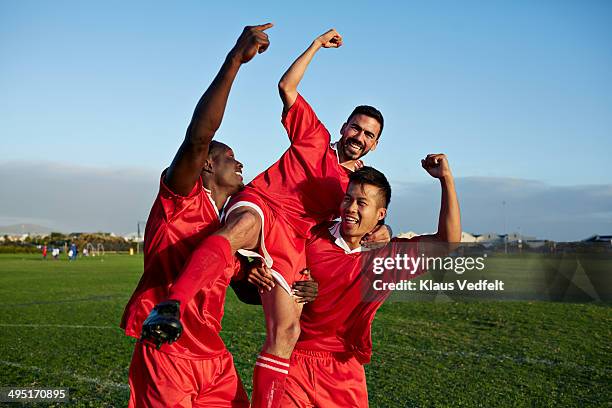 soccer players cheering after goal - champions day three fotografías e imágenes de stock