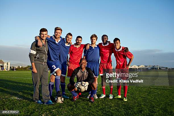 group photo of amateur soccer team - soccer team stock pictures, royalty-free photos & images