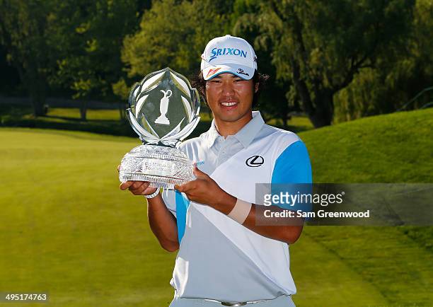 Hideki Matsuyama of Japan holds the trophy after winning the Memorial Tournament presented by Nationwide Insurance at Muirfield Village Golf Club on...