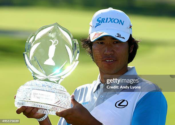 Hideki Matsuyama of Japan holds the trophy after winning the Memorial Tournament presented by Nationwide Insurance at Muirfield Village Golf Club on...