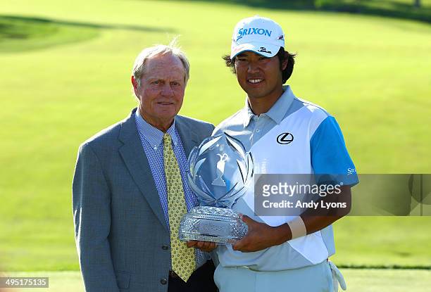 Hideki Matsuyama of Japan and Jack Nicklaus pose with the trophy after the Memorial Tournament presented by Nationwide Insurance at Muirfield Village...