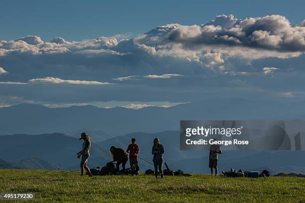 The evening sky and distant Tennessee horizon is viewed from Max Patch, a bald mountain that is a favorite camping spot for those hiking the...