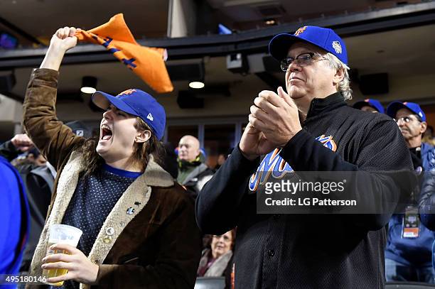 Actor Tim Robbins is seen cheering during Game 4 of the 2015 World Series between the New York Mets and the Kansas City Royals at Citi Field on...