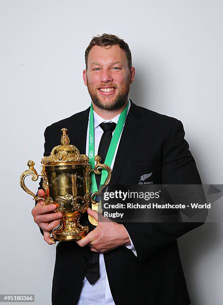 Wyatt Crockett of the New Zealand All Blacks poses with the Webb Ellis Cup after the 2015 Rugby World Cup Final match between New Zealand and...