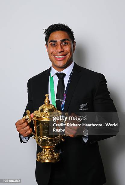 Malakai Fekitoa of the New Zealand All Blacks poses with the Webb Ellis Cup after the 2015 Rugby World Cup Final match between New Zealand and...