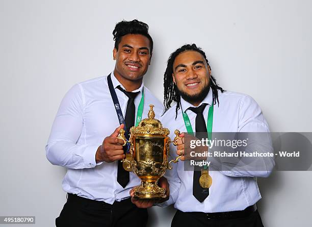 Julian Savea and Ma'a Nonu of the New Zealand All Blacks poses with the Webb Ellis Cup after the 2015 Rugby World Cup Final match between New Zealand...