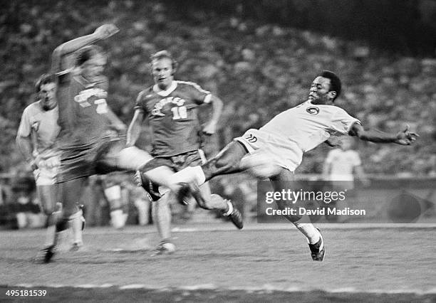 Pele of the New York Cosmos takes a shot during an North American Soccer League soccer match against the San Jose Earthquakes played on August 7,...