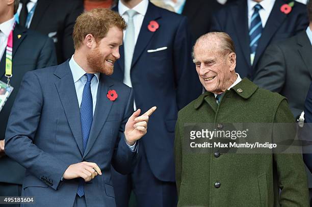 Prince Harry and Prince Philip, Duke of Edinburgh attend the 2015 Rugby World Cup Final match between New Zealand and Australia at Twickenham Stadium...