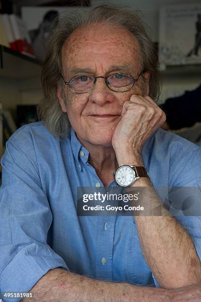 Writer Luis Eduardo Aute attends a book signing during 'Books Fair 2014' at the Retiro Park on June 1, 2014 in Madrid, Spain.