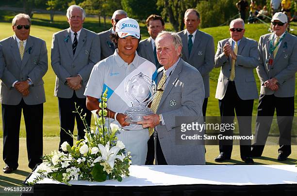 Hideki Matsuyama of Japan and Jack Nicklaus pose with the trophy after the Memorial Tournament presented by Nationwide Insurance at Muirfield Village...