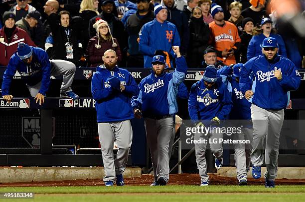 Members of the Kansas City Royals celebrate defeating the New York Mets in Game 4 of the 2015 World Series at Citi Field on Saturday, October 31,...