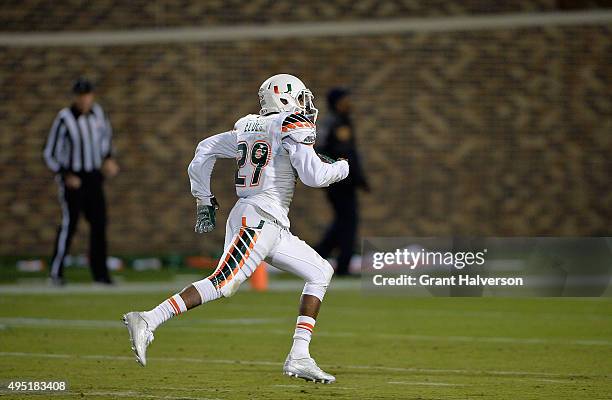 Corn Elder of the Miami Hurricanes breaks away for a touchdown during the final seconds of their game against the Duke Blue Devils at Wallace Wade...