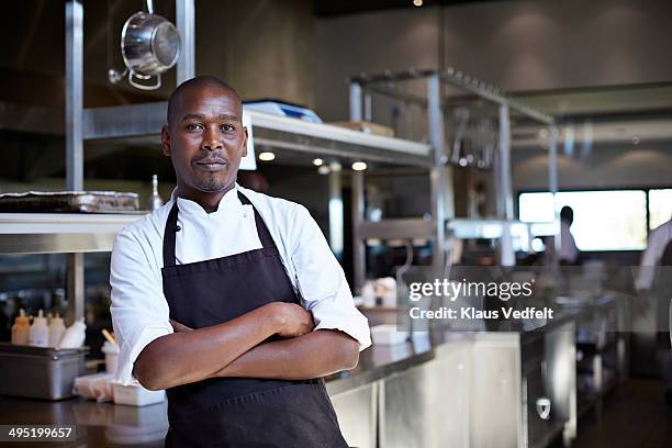 portrait of male chef at restaurant - chef arms crossed stock pictures, royalty-free photos & images