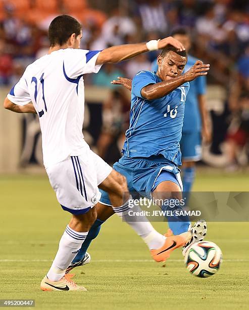 Honduras' Rony Martinez Almendarez vies for the ball with Israel's Eytan Tibi during their World Cup preparation match at the BBVA Compass Stadium in...