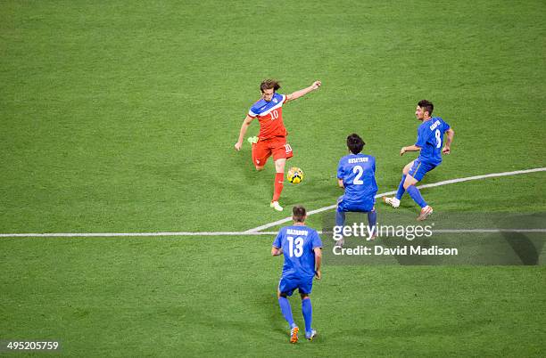 Mix Diskerud of the USA Men's National Soccer Team shoots the ball during a match between the USA and Azerbaijan played on May 27, 2014 at...