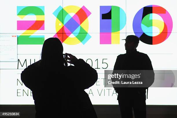 People take photos during the closing day of the exhibition on October 31, 2015 in Milan, Italy. The gates of the Universal Exhibition EXPO 2015...