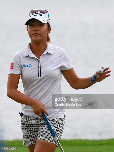 Lydia Ko of New Zealand acknowledges to spectators after she finished her 18th hole at the final round on Day 7 of Blue Bay LPGA 2015 at Jian Lake...