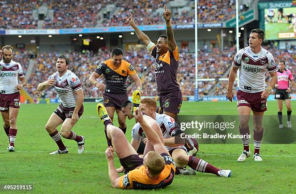 Jack Reed and Ben Barba of the Broncos claim a try during the round 12 NRL match between the Brisbane Broncos and the Manly-Warringah Sea Eagles at...