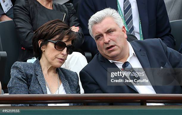Ruth Elkrief and French Minister of Transport Frederic Cuvillier attend Day 8 of the French Open 2014 held at Roland-Garros stadium on June 1, 2014...