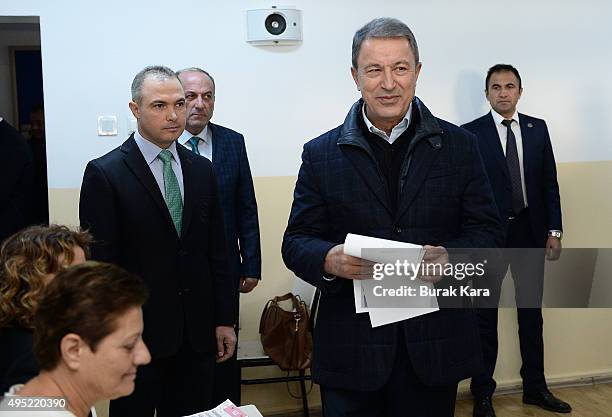 Turkish Army Chief of Staff General Hulusi Akar casts his vote at a polling station during a general election on November 1 in Ankara, Turkey. Polls...