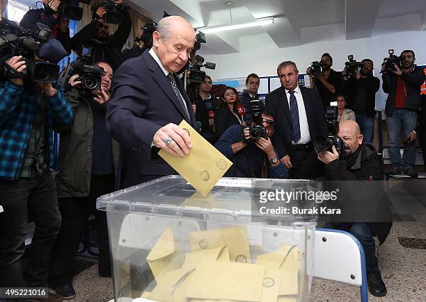 Nationalist Movement Party leader Devlet Bahceli casts his vote at a polling station during a general election on November 1 in Ankara, Turkey. Polls...