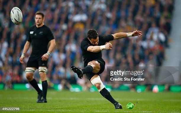 New Zealand captain Richie McCaw looks on as Dan Carter kicks a penalty during the 2015 Rugby World Cup Final match between New Zealand and Australia...
