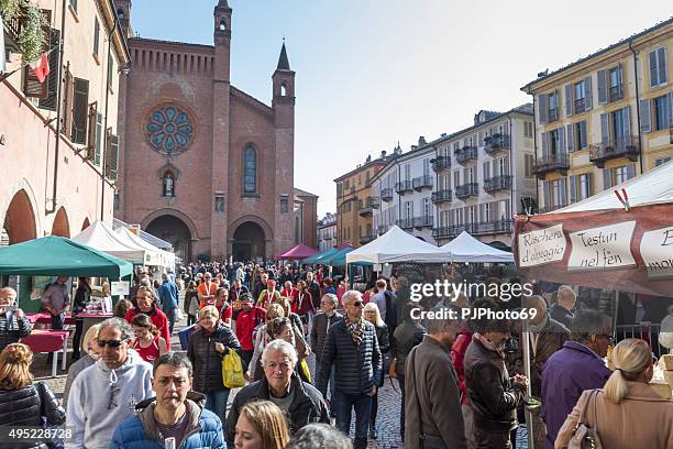 people walking in alba (italy) during truffle fair - truffle stock pictures, royalty-free photos & images