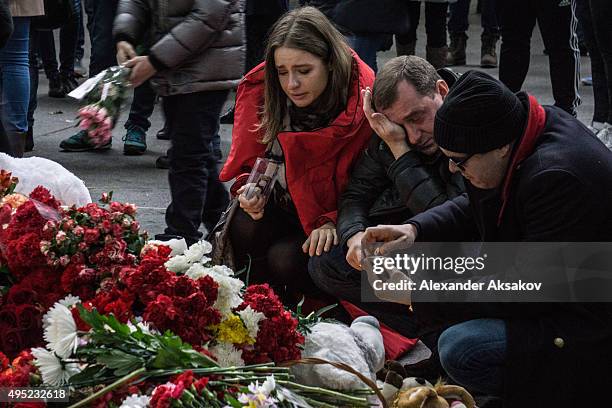 People mourn the victims of Airbus A321 crash at Pulkovo Airport on November 1, 2015 in St. Petersburg, Russia. A Russian Airbus-321 aircraft with...