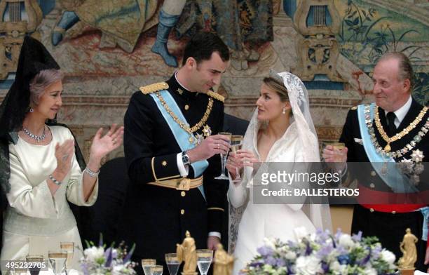 Spanish Crown Prince Felipe of Bourbon and his wife Princess of Asturias Letizia Ortiz toast next to Juan Carlos of Spain and Queen Sofia during the...